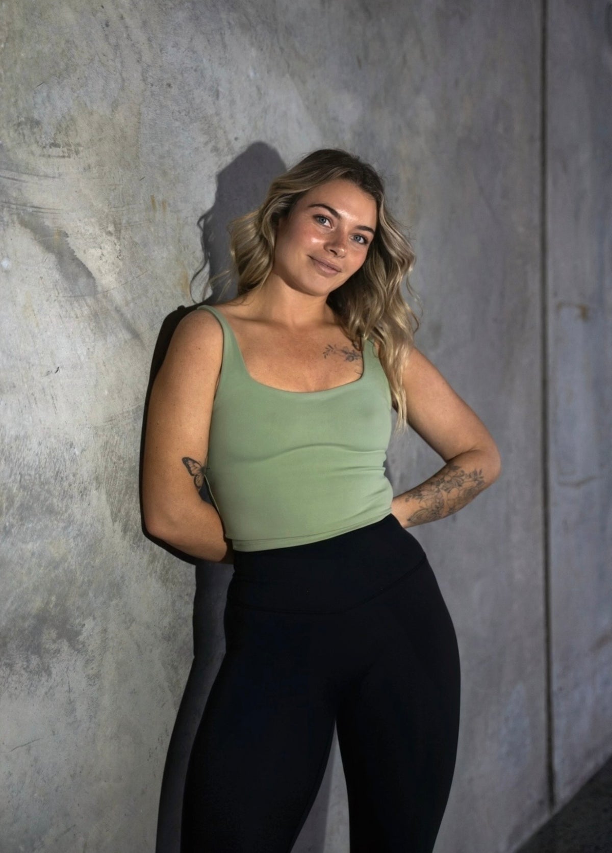 Sage green crop active tank with built in support